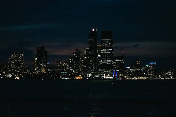 istock Manhatten skyline at night 1409946333