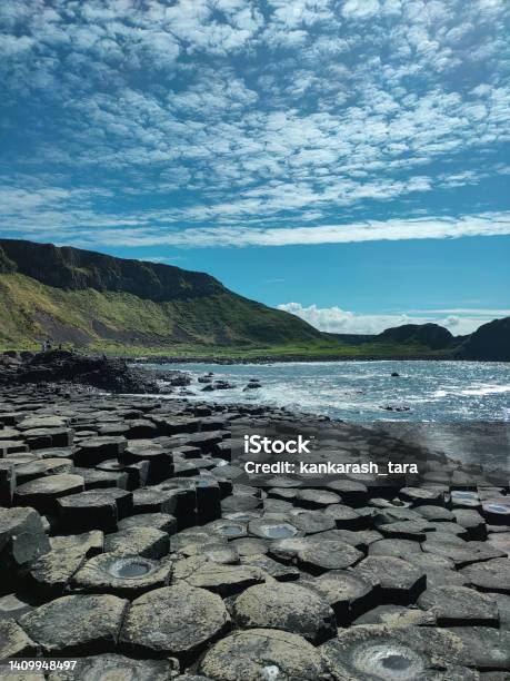Photograph Of The Giants Causeway In Northern Ireland On A Sunny Day In Midspring Stock Photo - Download Image Now