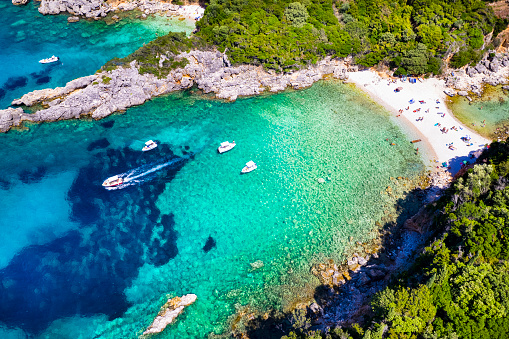 Corfu island, Greece . Aerial view of beautiful double beach with turquoise clear waters Limni beach Glyko near Paleokastritsa