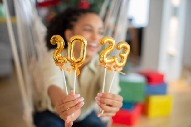 istock Happy woman celebrating Christmas 1409950118