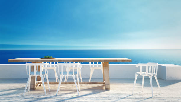 istock Dining outdoor sea view beach - 3D rendering 1409951398