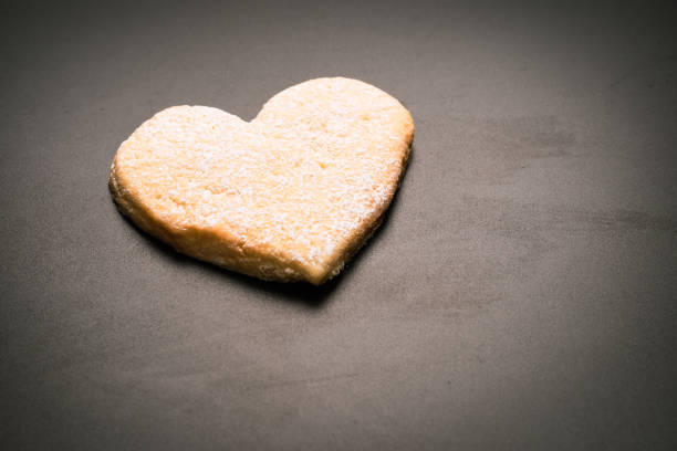 Shortbread in the shape of a heart isolated on a white background.