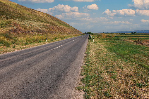 Empty asphalt road in mountains