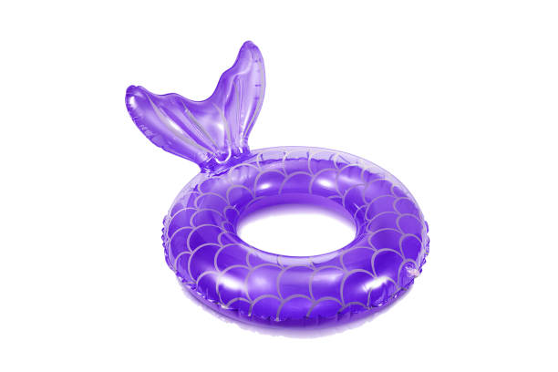 lila schwimmring - inner tube inflatable isolated toy stock-fotos und bilder