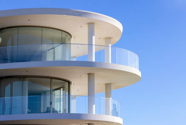 istock Closeup brand new, modern apartment building, sky background with copy space 1409963908