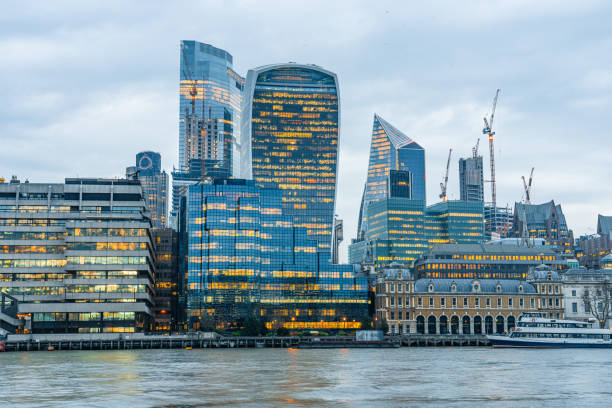 istock Night view of thames river in London 1409963961