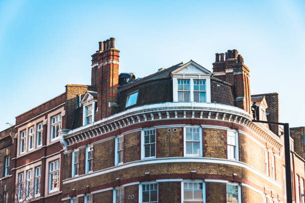 LONDON - November 4, 2020: Rooftops and windows of brick buildings in London