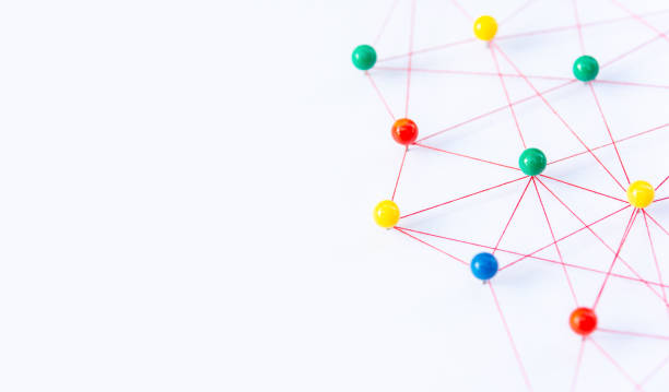 istock Linking entities, Blockchain, social media, Communications Network, The connection between the two networks. Network simulation on paper linked together by yarn 1409964369