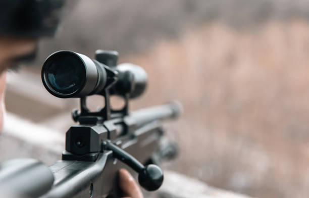 istock soldier with weapons in hand 1409965602
