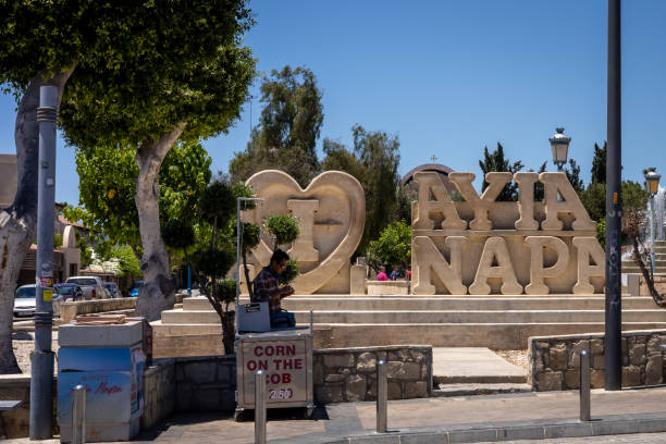 Ayia Napa, Cyprus - June 24, 2022:   "I Love Ayia Napa” sculpture at the entrance of town central square. A popular photo location for tourists. Ayia Napa, Cyprus - June 24, 2022:   "I Love Ayia Napa” sculpture at the entrance of town central square. A popular photo location for tourists. cyprus agia napa stock pictures, royalty-free photos & images