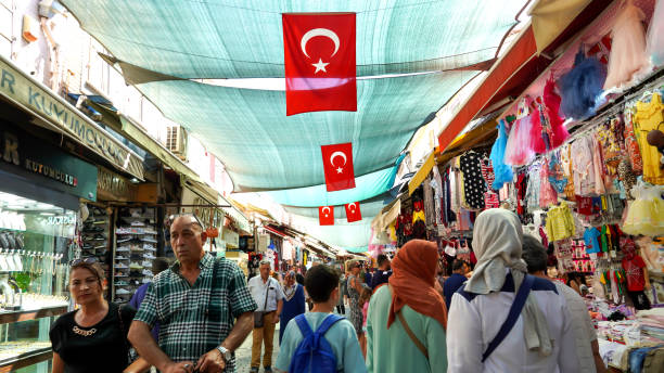 Daily Life in Kemeralti Bazaar, an area of the city Izmir Daily Life in Kemeralti Bazaar, an area of the city Izmir, Turkey that is popular amongst tourists on 19 July 2022 fashion bazaar stock pictures, royalty-free photos & images
