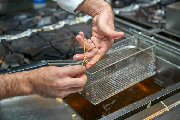 istock Cook's master class how to make a form of spaghetti 1409981139