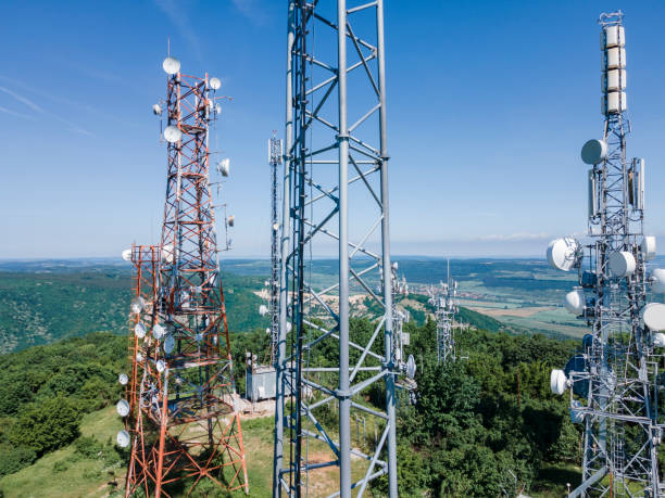 istock Telecommunication towers in greenery, aerial view. 1409982092