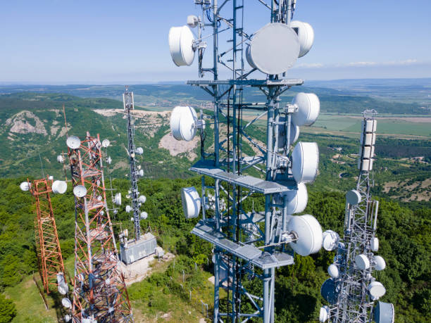 istock Telecommunication towers in greenery, aerial view. 1409982099