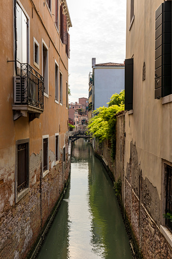 Old houses and canal view in Venice, Italy