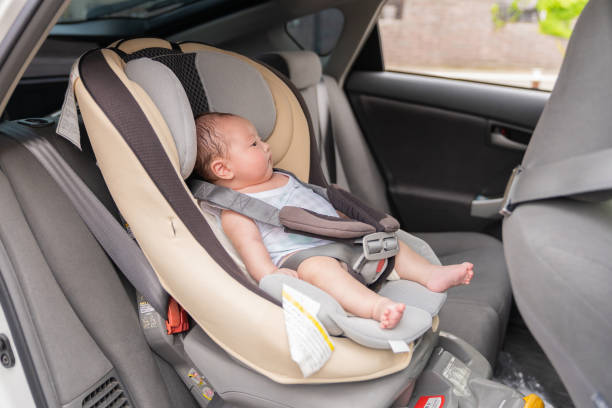 istock cute baby , child seat 1409984477