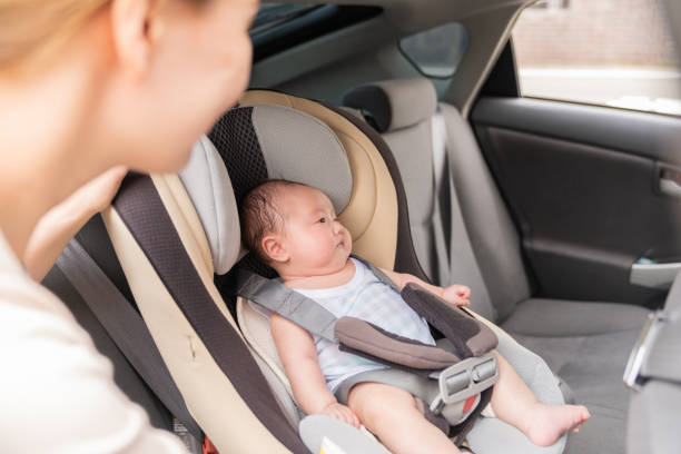 istock cute baby , child seat 1409984679