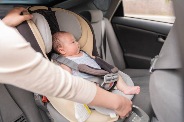 istock cute baby , child seat 1409984723