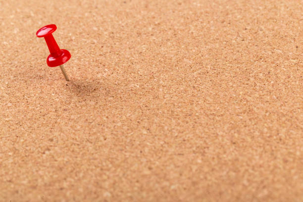 istock Pin board texture for background and colorful pins 1409985225