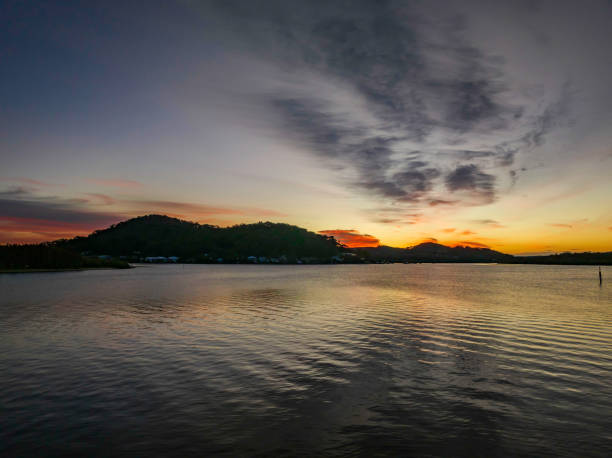 istock High cloud sunrise at the waterfront 1409987660