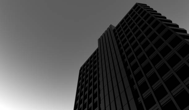 istock View from above modern skyscraper building monochrome black and white design.Architectural black facade design of a high rise house, building or office against a dark gray sky. 3D rendering. 1409988454