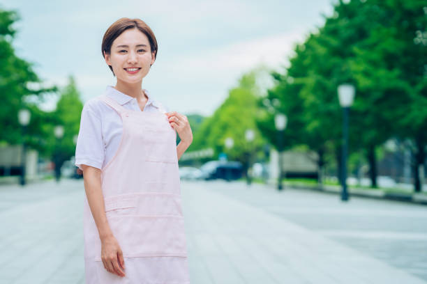 istock Young woman in an apron 1409991496