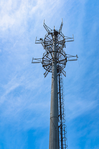 5G base station antenna tower standing on the street