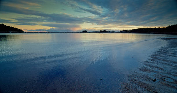 View of Seal Harbor, on the edge of Acadia National Park in Maine at sunset.