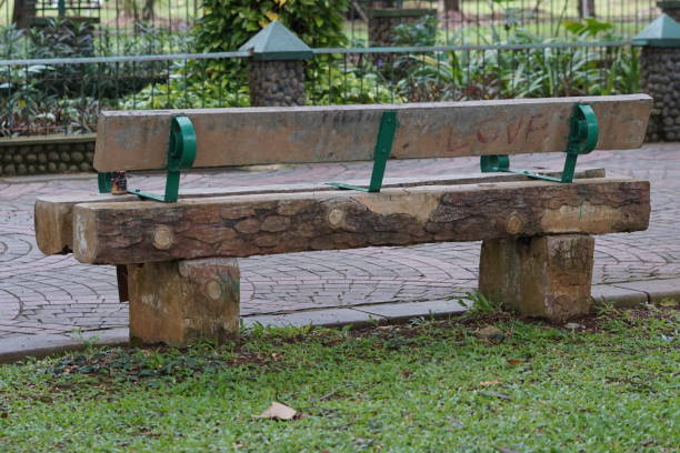 Wooden Garden Chairs have a unique design, where people sit and enjoy the park.