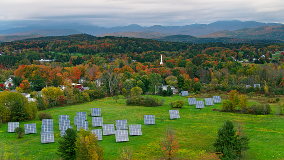 Aerial shot of fall colors in the town of Williston, Vermont on an overcast day.