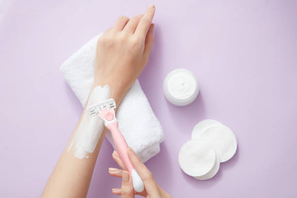 istock A moment of using razor blade on hand in color background 1409996598