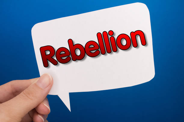 istock Speech bubble in front of colored background with Rebellion text. 1410000096