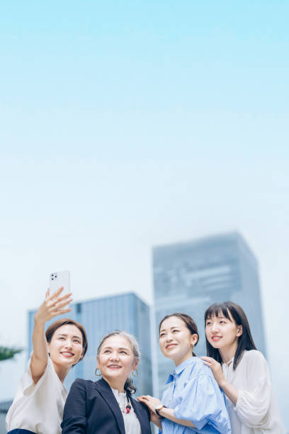 istock Women of various ages taking commemorative photos 1410001250