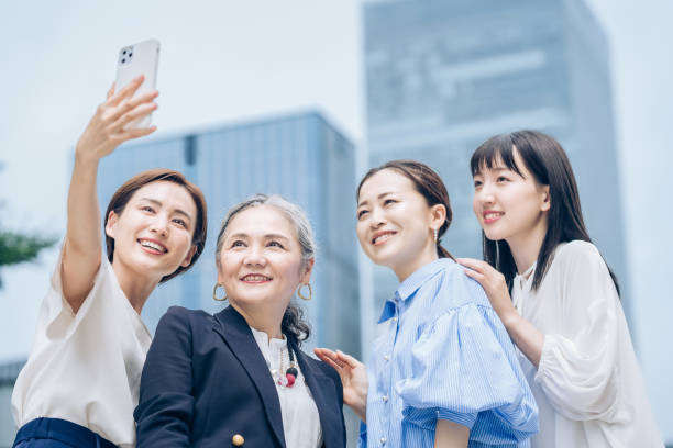 istock Women of various ages taking commemorative photos 1410001861