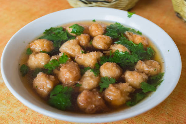 A bowl of meatball soup