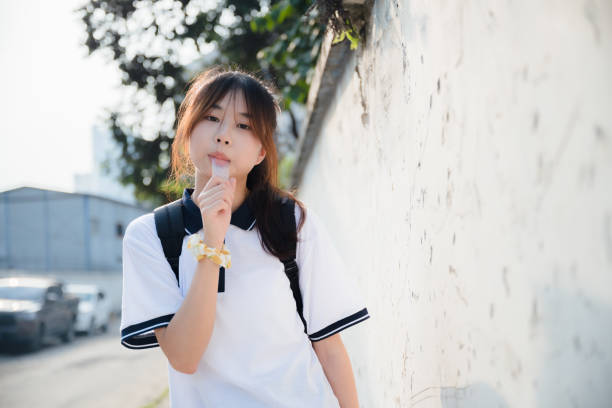 istock Asian girls in the sun 1410015978