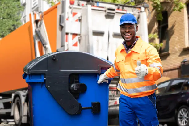 Photo of Garbage Removal Man Doing Trash