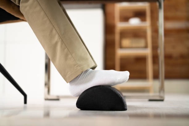 Footrest Against Pain In Office. Shifting Posture