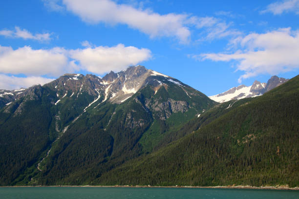 istock Coastal mountain range in Favorite Channel, Alaska, USA 1410025182