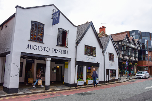 Chester, UK: Jul 3, 2022: A general view of Northgate Street, close to the Roman Walls. It is  a popular area with independent shops, restaurants and businesses.