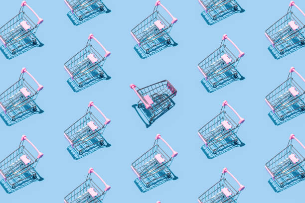 istock Pattern of supermarket shopping cart on pastel blue background. Creative design for packaging. Online shopping. Seamless pattern. Black friday sale concept. Break the pattern. Sustainable, minimalist lifestyle. 1410028765