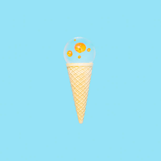 istock Creative aesthetic summer sunrise scene. Ice cream cone with fresh peach reflected in a glass sphere on bright blue background. Summer vibes, tropical fruit composition. 1410028856