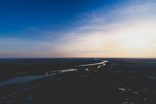 istock Sunset over the landscape and river 1410031132