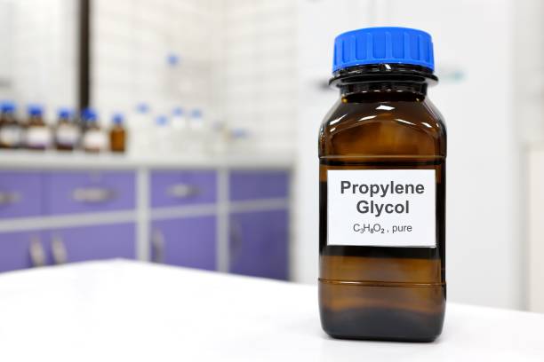 istock Selective focus of propylene glycol liquid chemical compound in dark glass bottle inside a chemistry laboratory with copy space. 1410032552