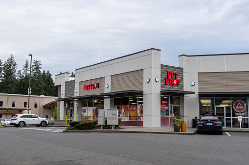 Mill Creek, WA USA - circa June 2022: Exterior view of a Pet Pros store on a cloudy day.