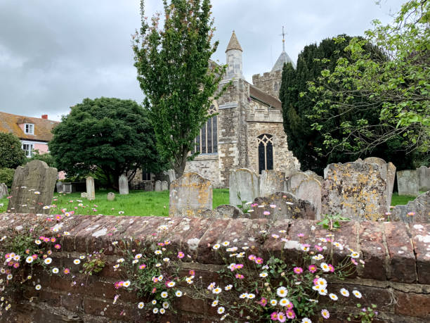 The churchyard at St. Marys in Rye, UK The churchyard and tombstones at the church of St. Mary the Virgin in the historic Cinque Port town of Rye, East Sussex, UK marys stock pictures, royalty-free photos & images