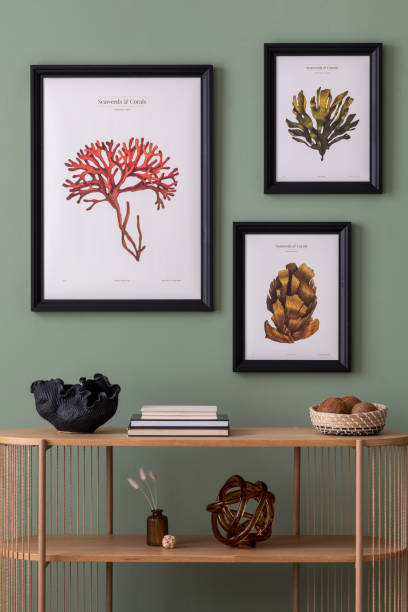 istock The creative boho composition at living room interior with wooden console and elegant personal accessories. Mock up poster. Dried flowers in cozy apartment. Home decor. Template. 1410039051