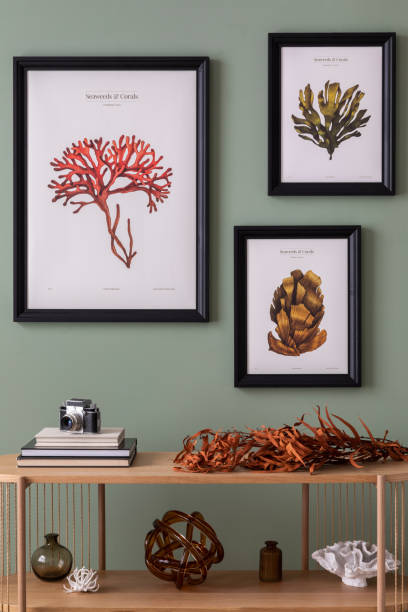 istock The creative composition at living room interior with wooden console and elegant personal accessories. Mock up poster. Green wall.  Home decor. Template 1410039054