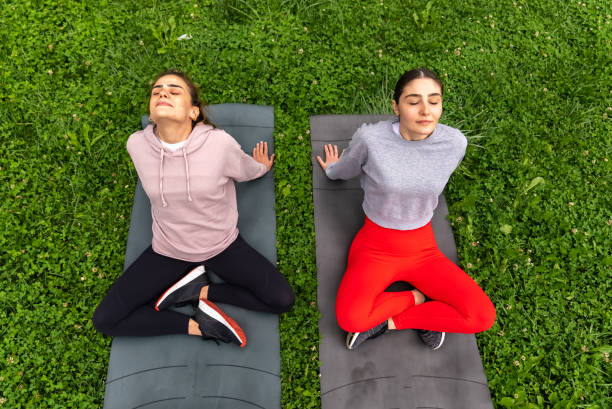 istock Outdoor exercises on yoga mat 1410039855