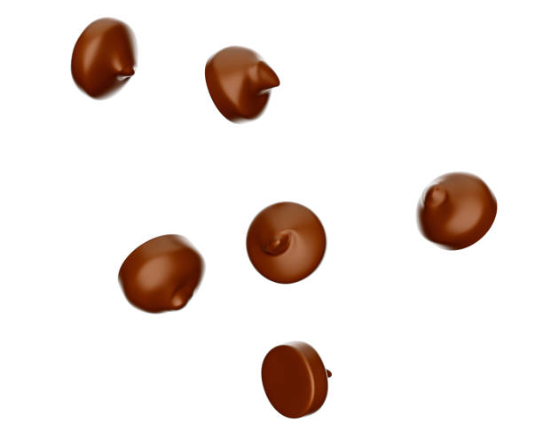 istock Chocolate chips morsels or drops, Falling flying isolated on white background 3d illustration 1410043889